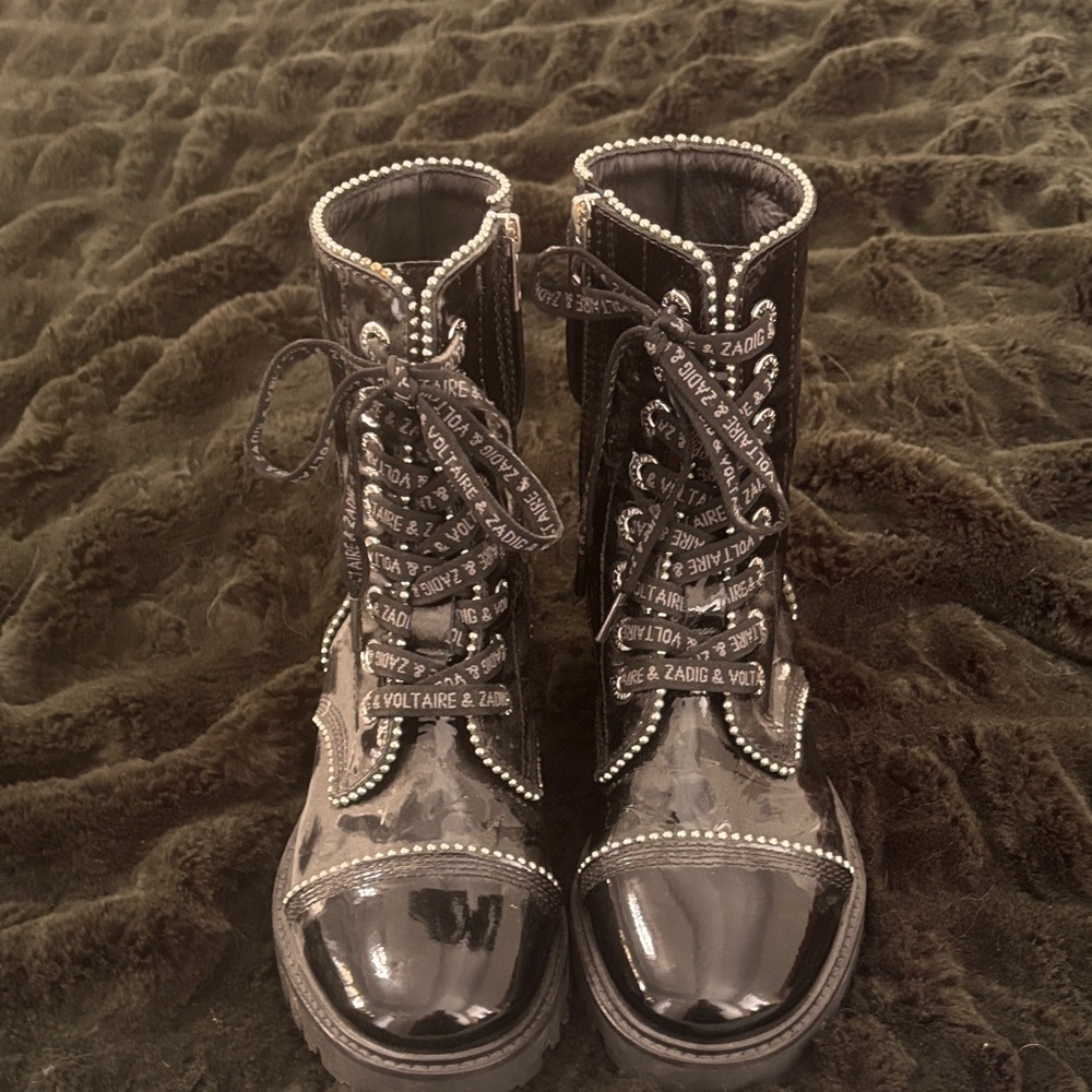 Stylish Black Combat Boots with stud detailing.